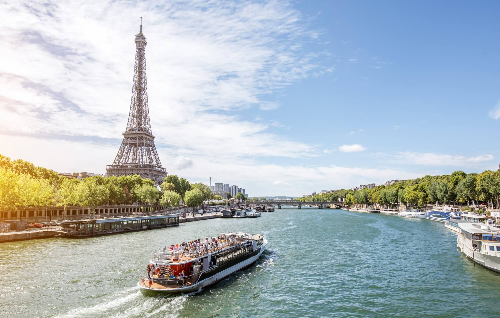 A tourist bat on the Seine, The Eiffel Tower in the background