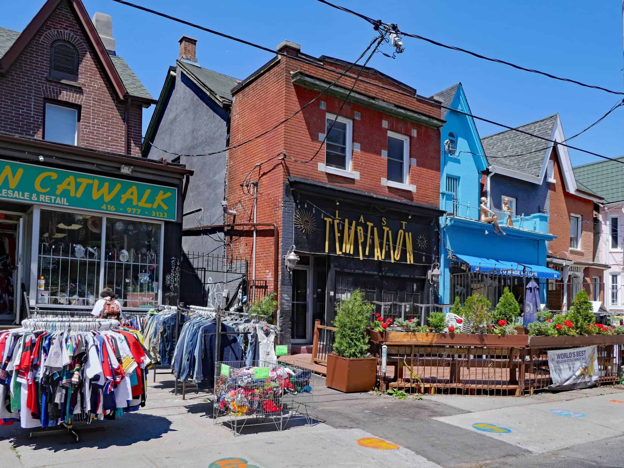 Kensington Market, a downtown area where old Victorian houses have been converted into colourful shops selling vintage clothing and exotic foods.