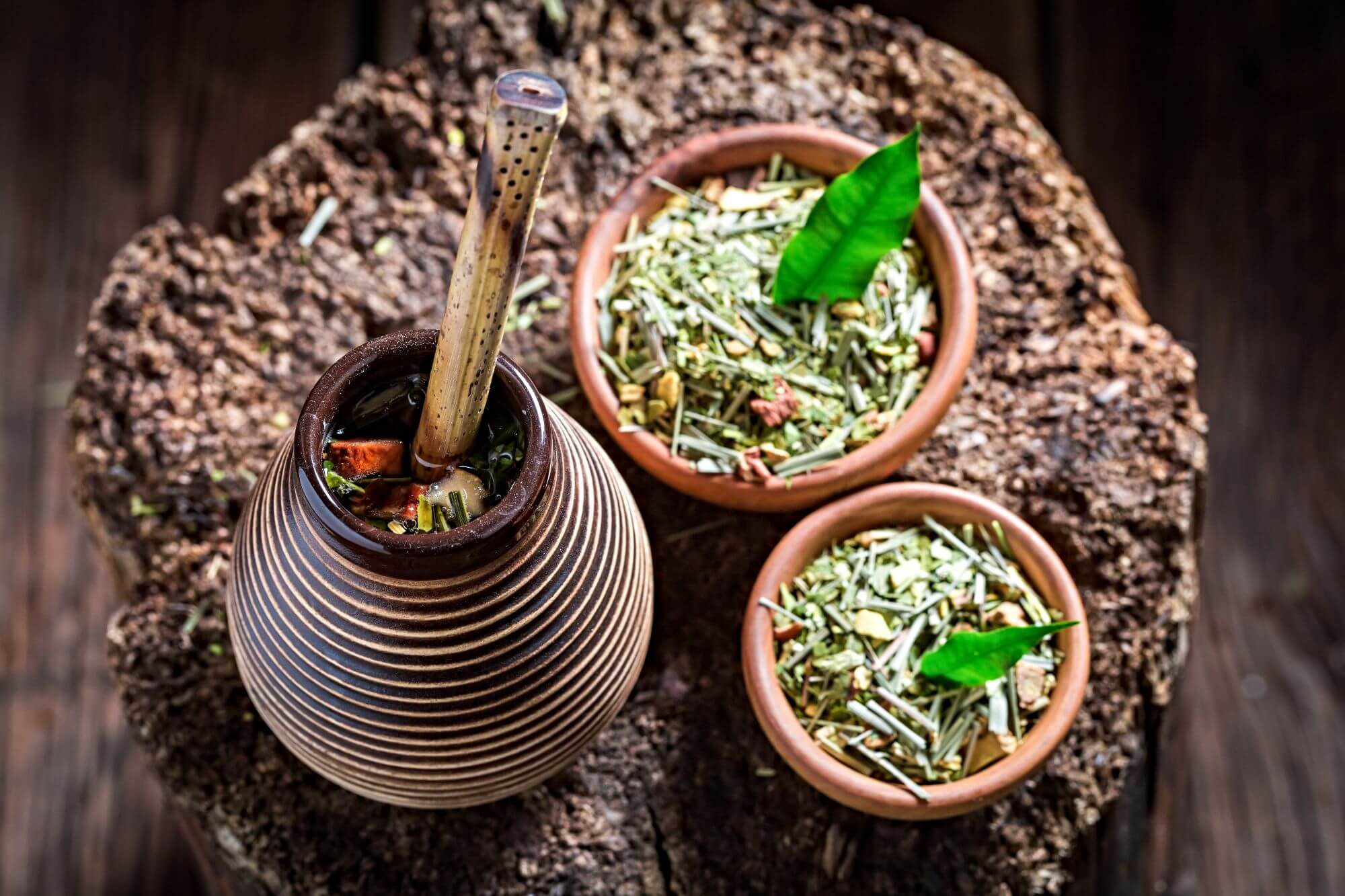 Yerba mate prpared and serve in traditional mugs