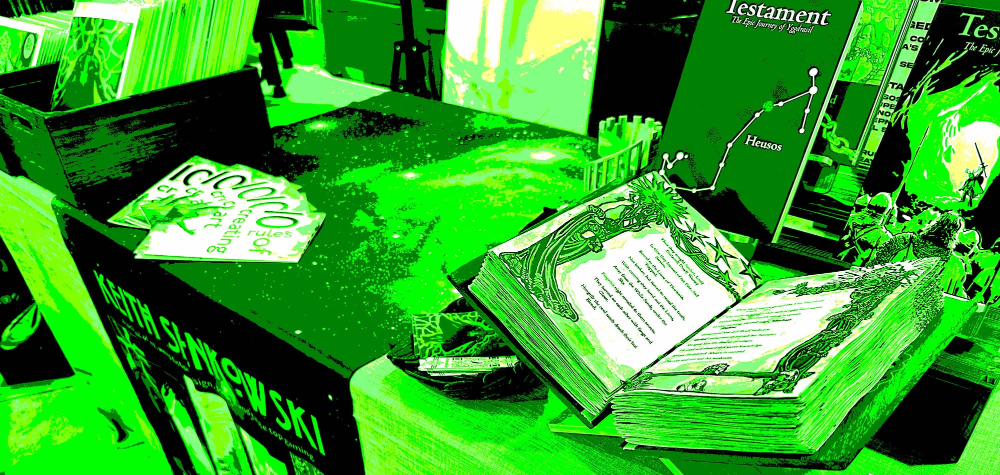 Stylized image in green of an artist table for comic and gaming conventions.
