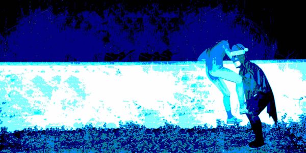 Batman in a Santa hat helping drunk spiderman over a low wall