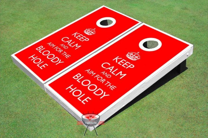 A bright red cornhole board (no, for real) that reads "KEEP CALM AND AIM FOR THE BLOODY HOLE" 