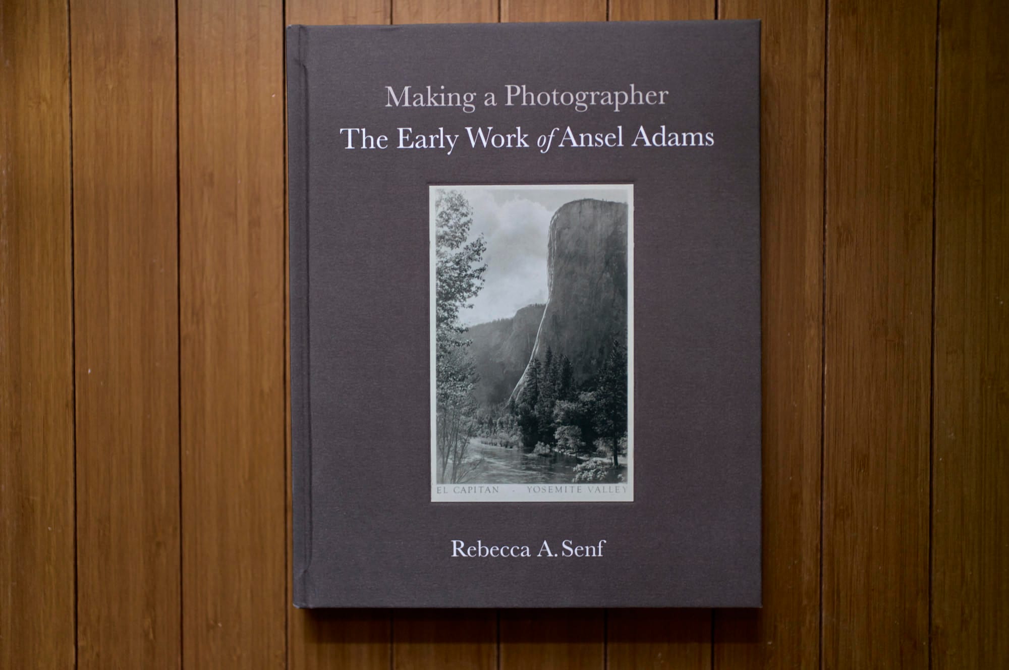 A single grey linen bound book of the early works of Ansel Adams