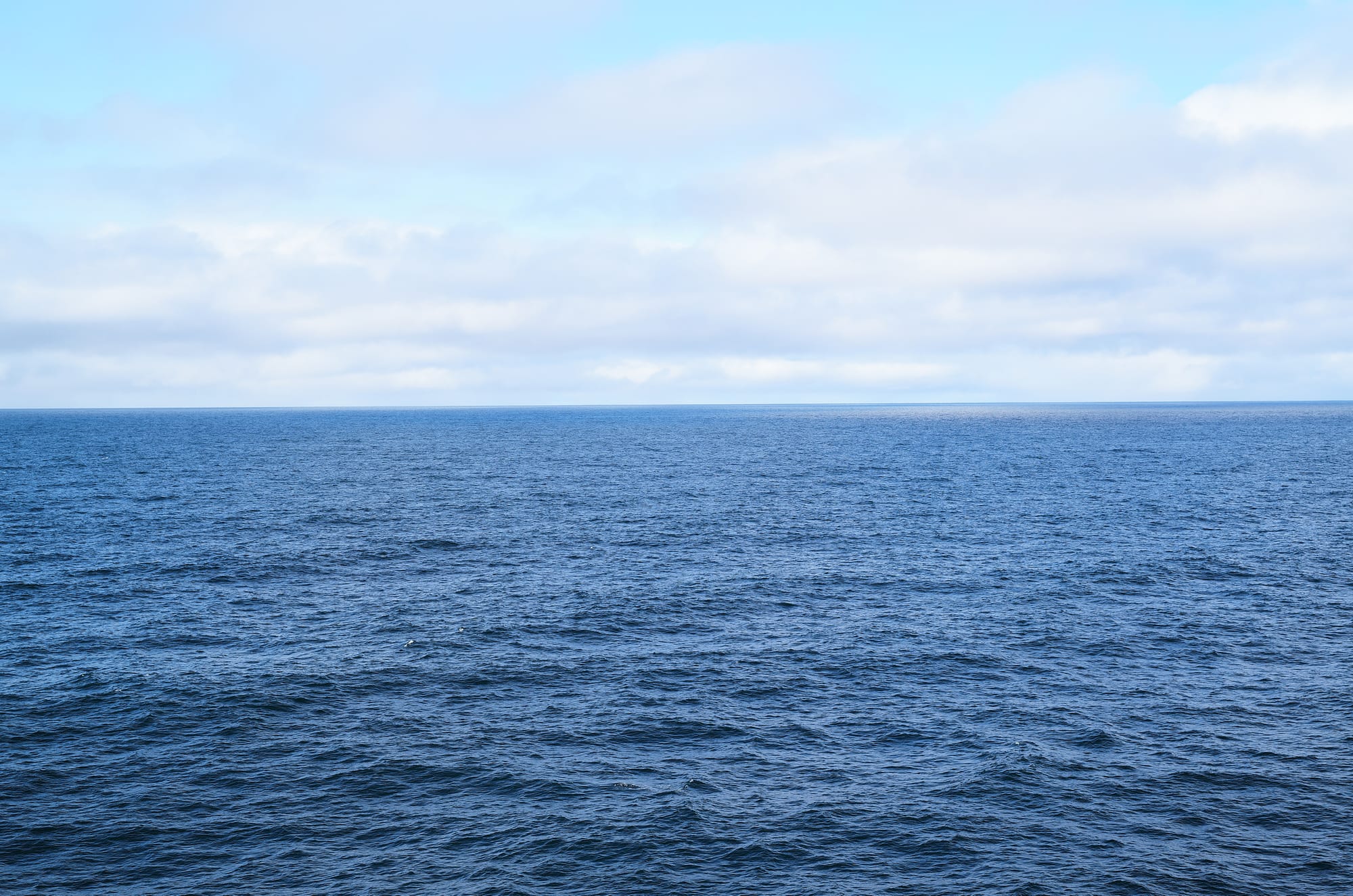 Ocean with clouds.
