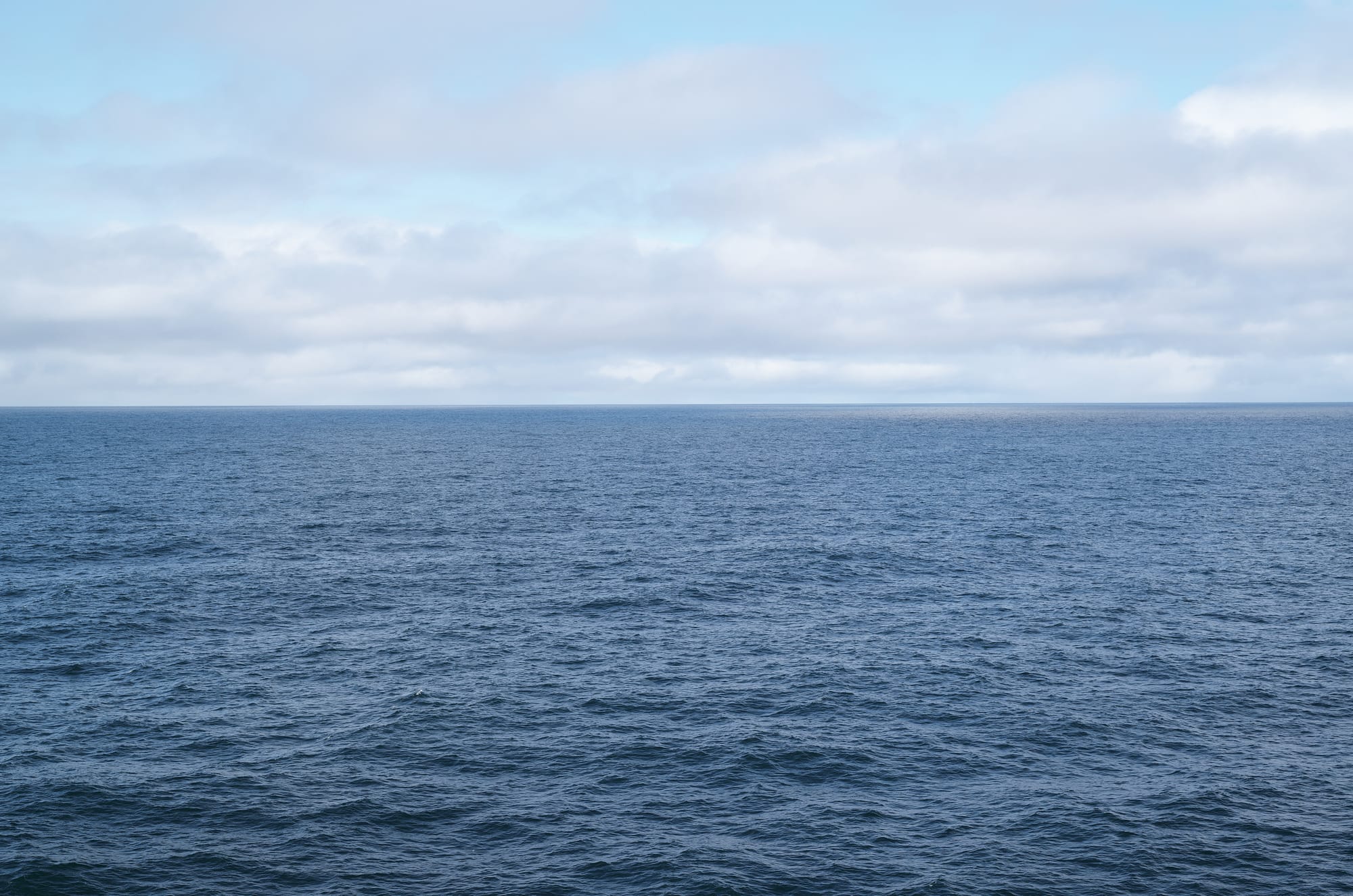 Ocean with clouds.
