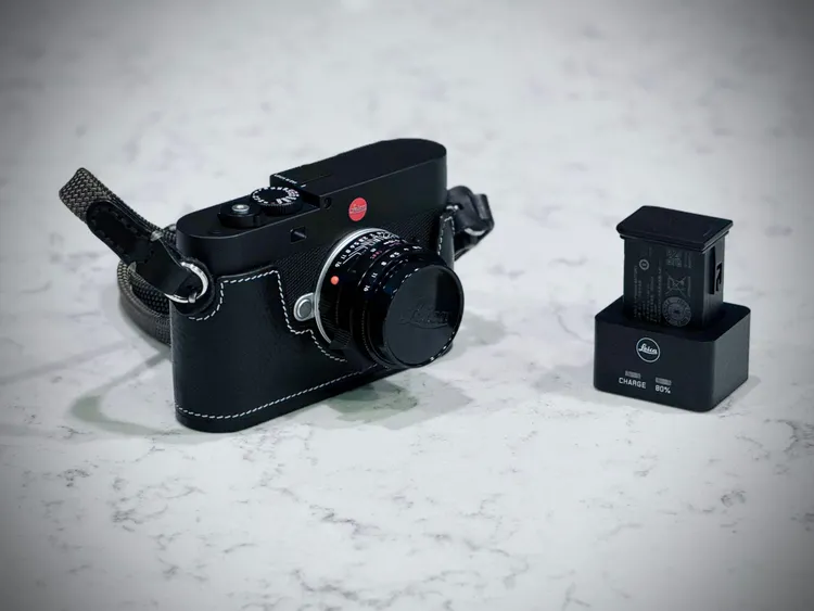 Camera, camera battery and charger.