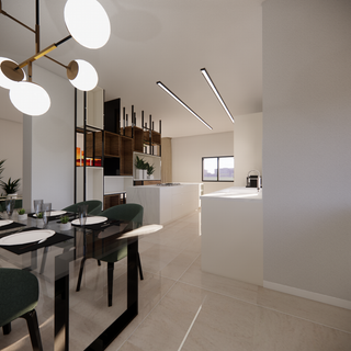 Beautiful white kitchen, with built-in refrigerators, Built-in oven and microwave and a large island with sitting space.