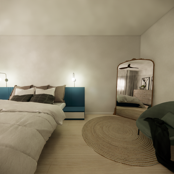 Bedroom corner featuring a teal headboard, round jute rug, arched floor mirror, and green accent chair.          Ask ChatGPT