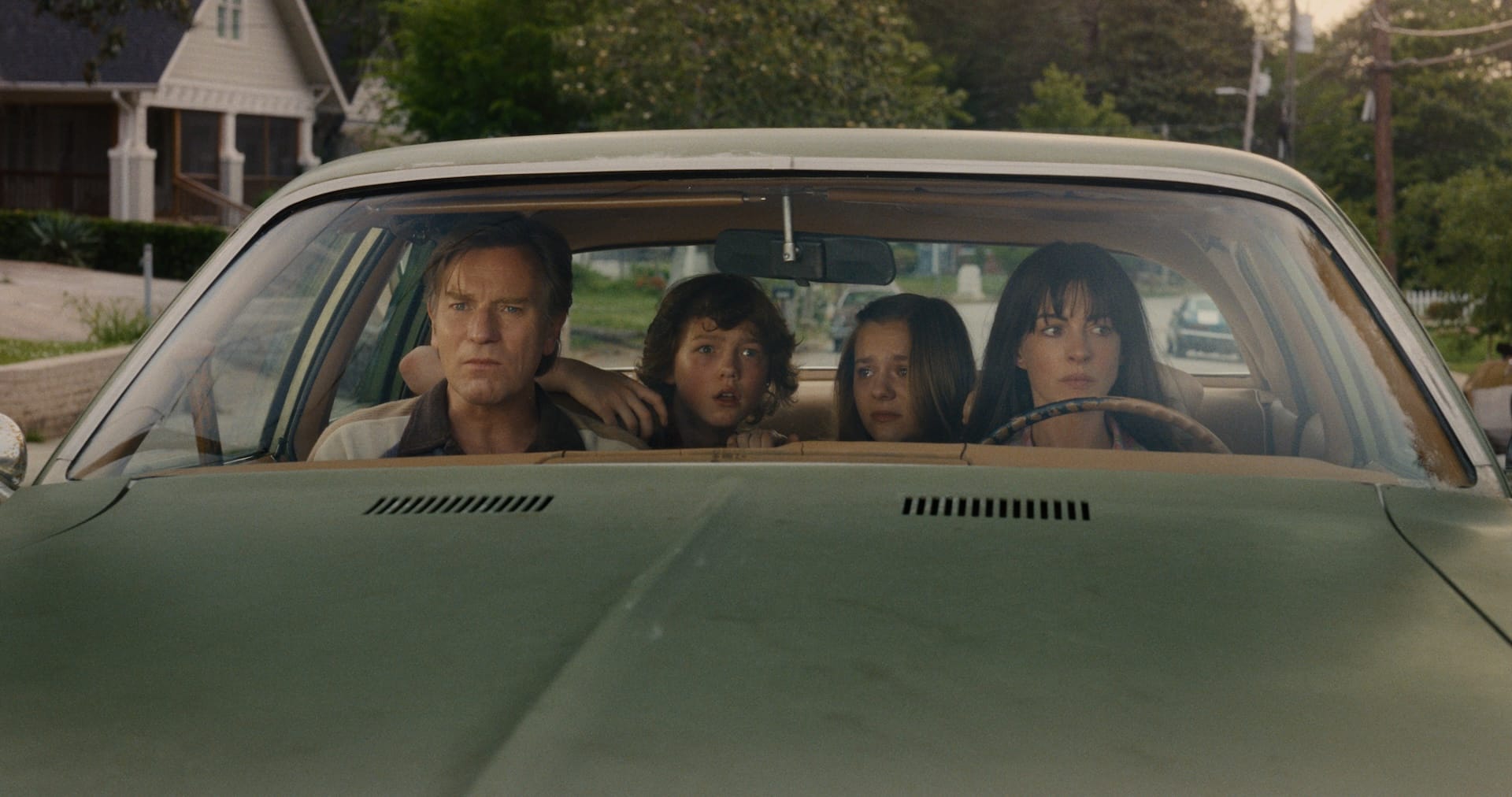 Ewan McGregor, Christian Convery, Maisy Stella, and Anne Hathaway in The End of Oak Street.