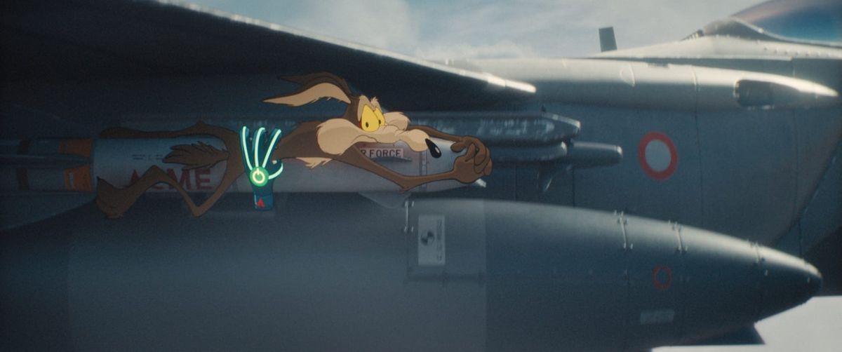 The Coyote clings to a fighter jet in Coyote vs. Acme.