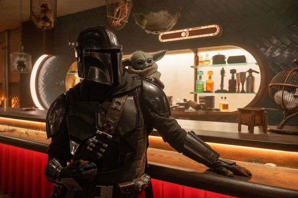 The Mandalorian (Pedro Pascal) and Grogu in Star Wars: The Mandalorian and Grogu.