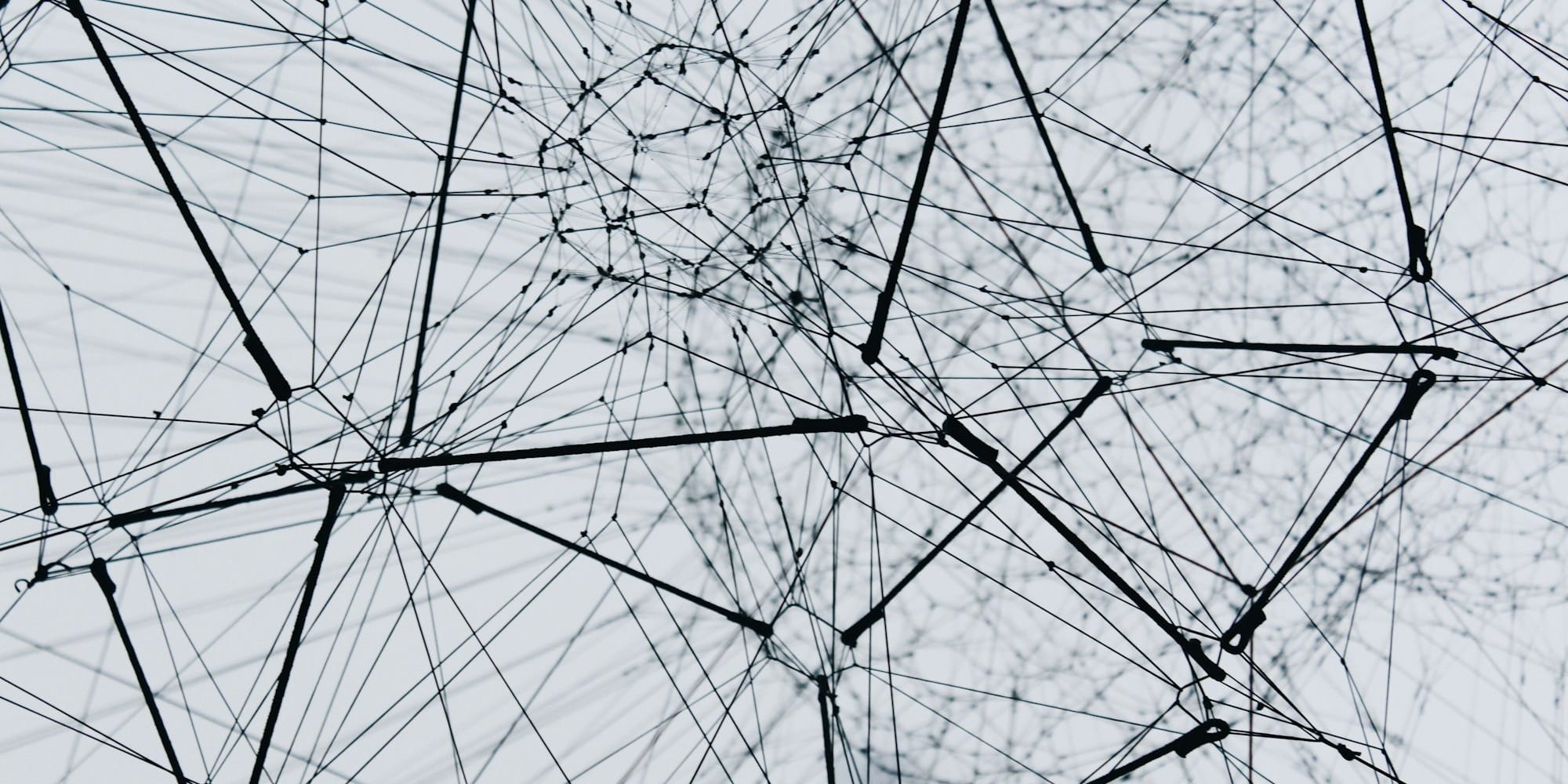 A dense, abstract lattice of interconnected nodes and links, suggesting a structured network of linked clinical concepts. 