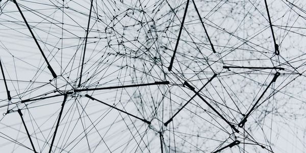 A dense, abstract lattice of interconnected nodes and links, suggesting a structured network of linked clinical concepts. 