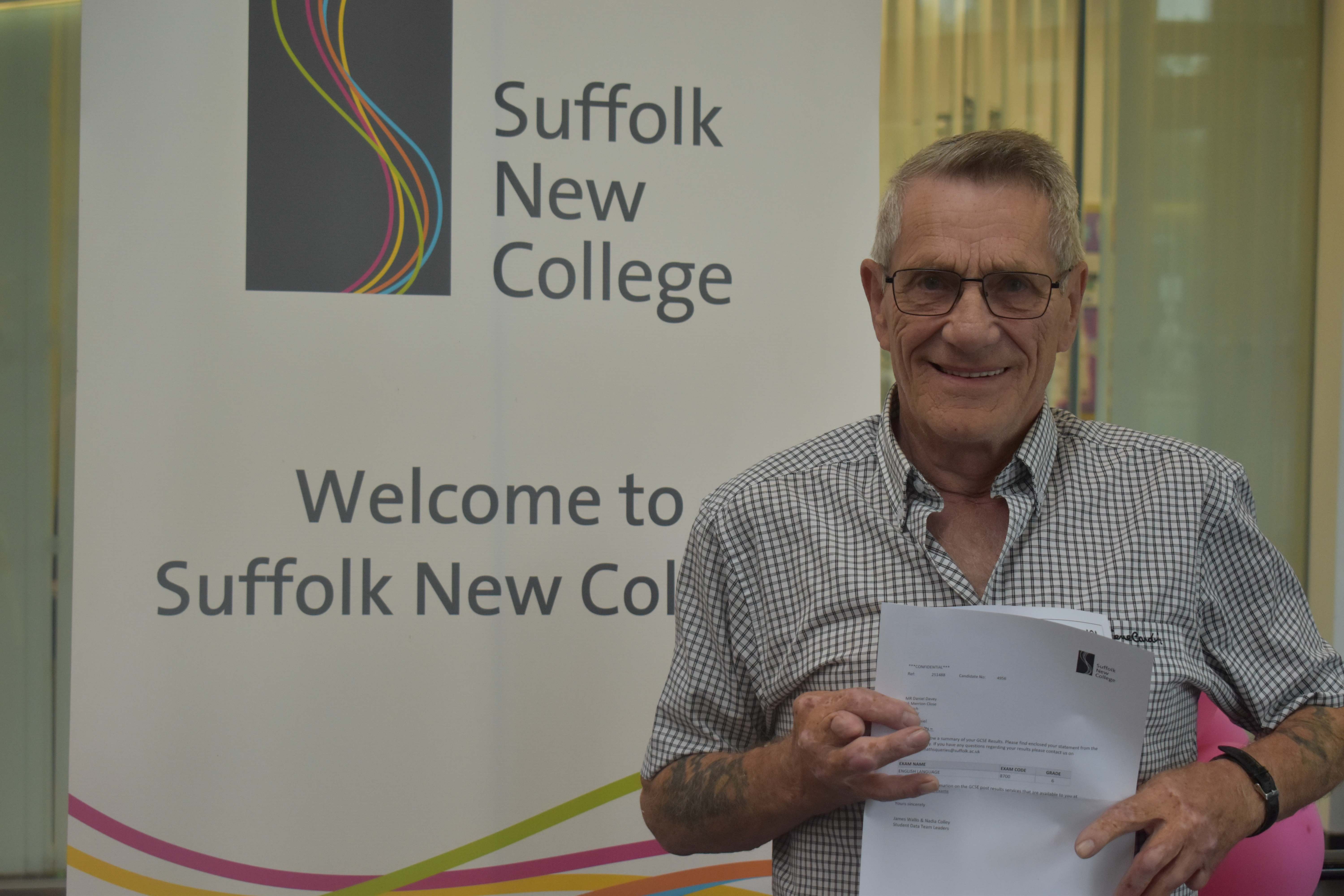 Danny Davey from Ipswich with his English GCSE certificate