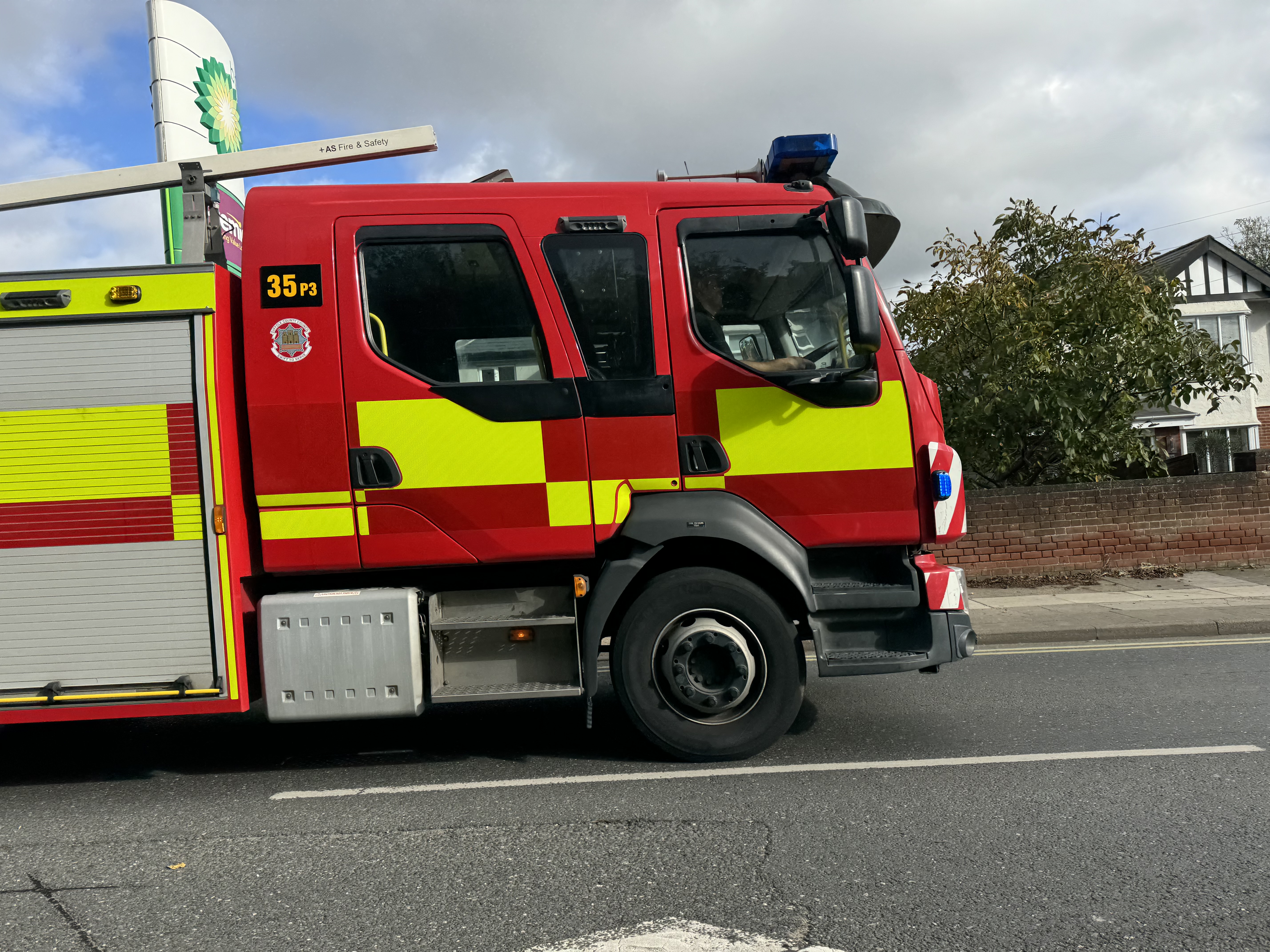 A fire engine travelling down Norwich Road in Ipswich