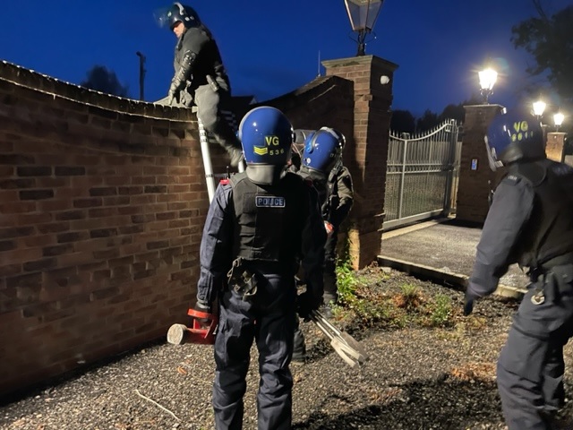 Police accessed the property by climbing over a perimeter wall