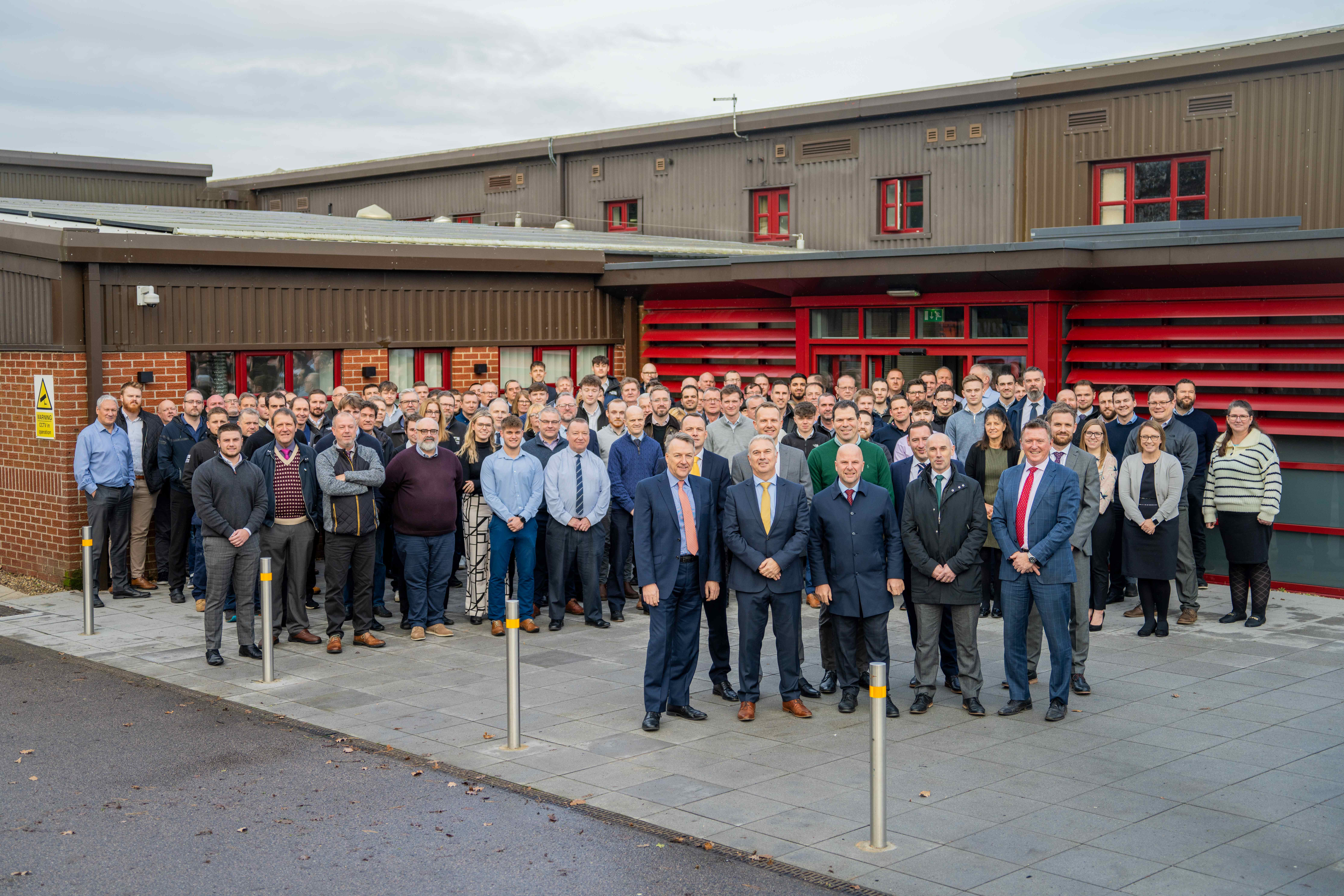 The team at Barnes Construction outside their offices in Ipswich