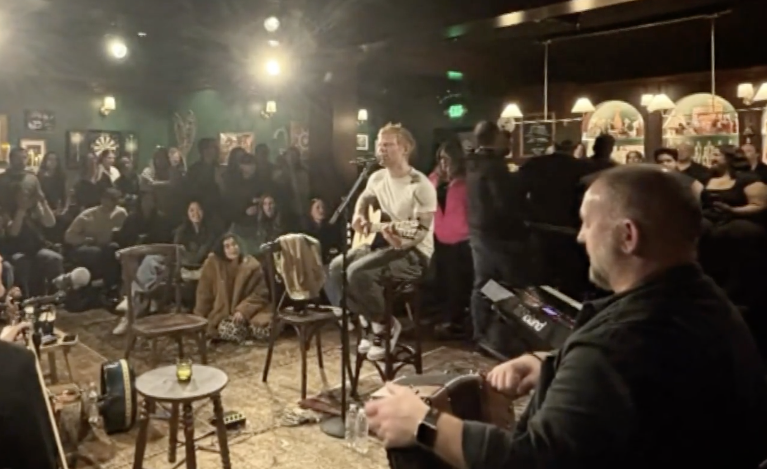 Ed Sheeran performing at the pop-up pub The Old Phone in the US