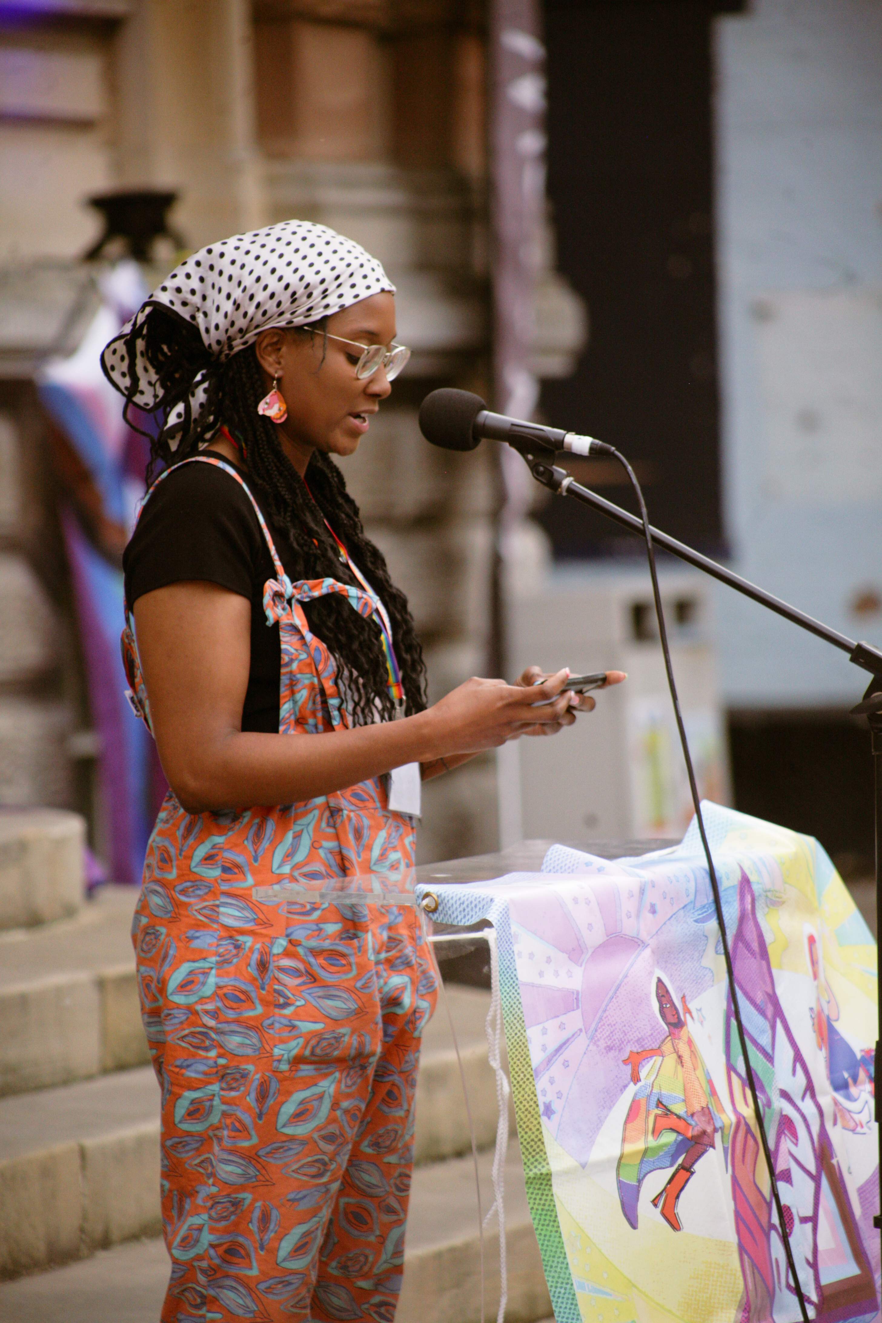 person giving a speech at the town hall