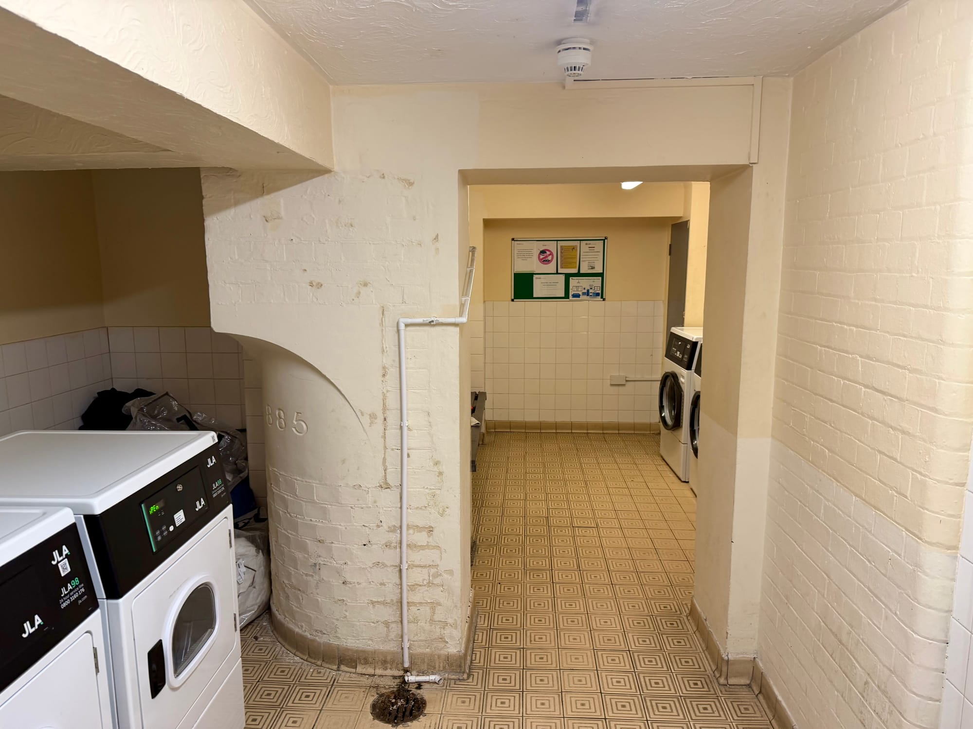 The launderette has three washing machines and three dryers
