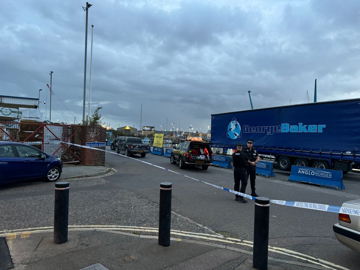 Police at the scene of the incident at Ipswich waterfront