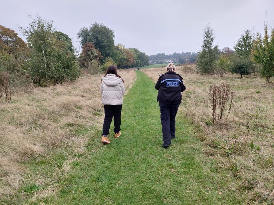 A policewoman and council worker litter picking in Gippeswk Park, Ipswich