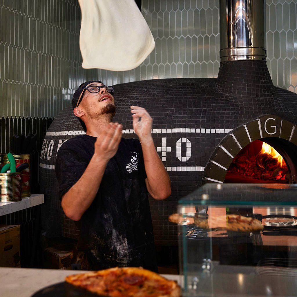 A chef at one of Moto Pizza's Essex restaurants