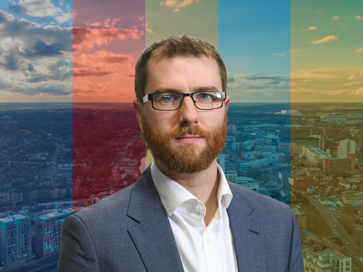 Tim Miller on a backdrop of Ipswich from above and political party colour overlays