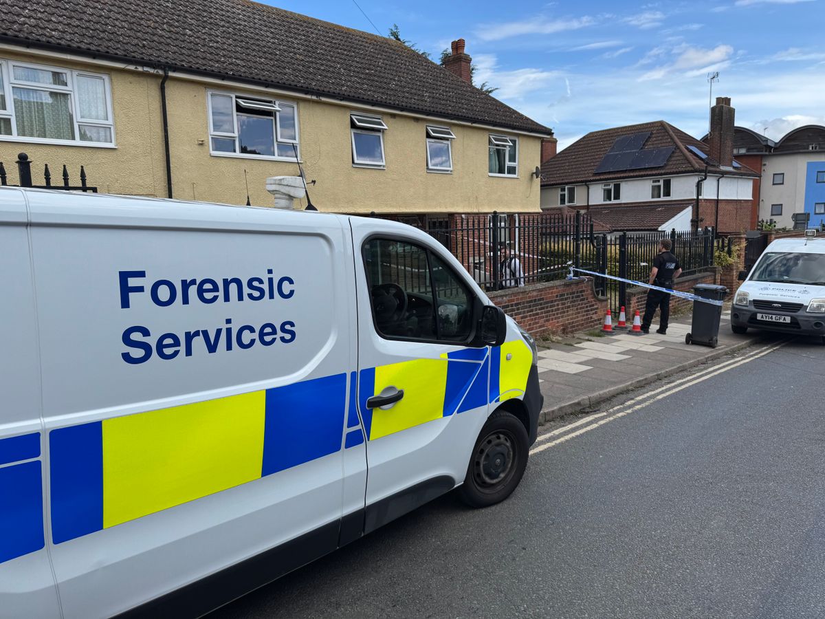 Forensic Services van outside a property on Station Street in Ipswich following a stabbling