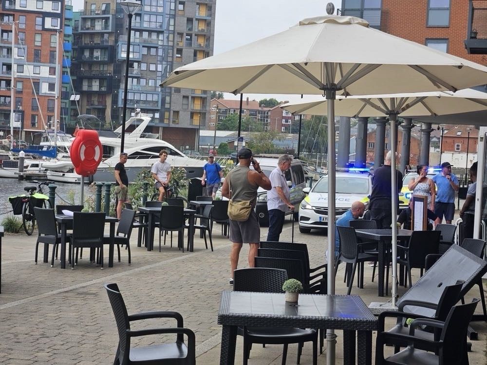 Passersby and customers assisted police detain the man