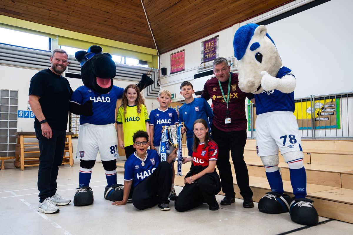 Ipswich Town chairman surprises 550 pupils at Gusford Primary