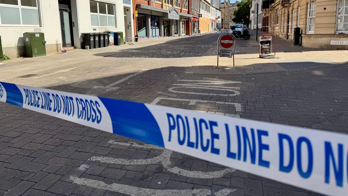Glass strewn across street after explosion rips through Ipswich flat