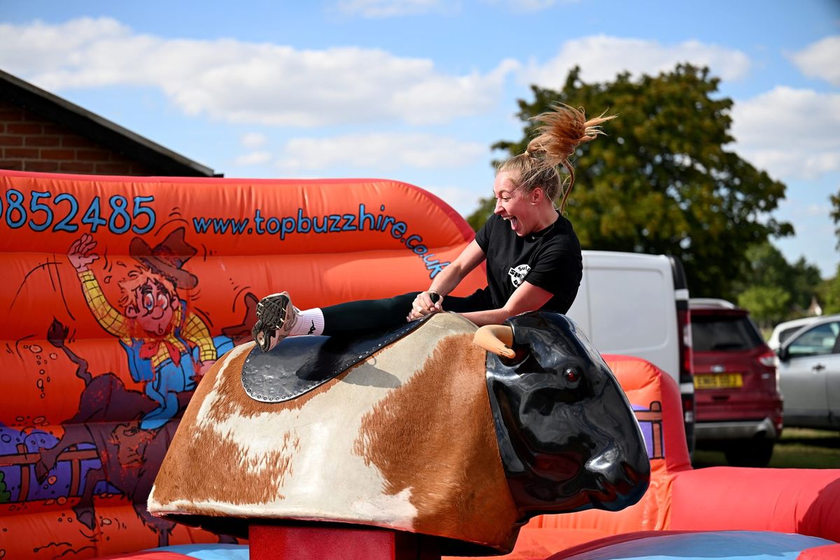 Welly wanging and rodeo bulls raise £10,000 for charity