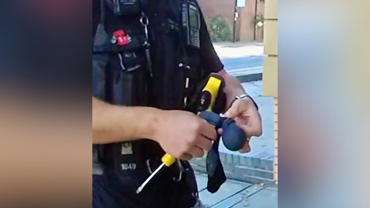 Man arrested after entering police station with screwdriver and sock and ball