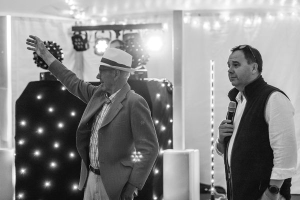 Wallace Binder and Richard Binder giving a speech