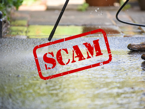 Pressure washing a driveway