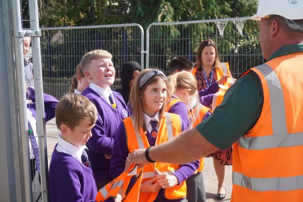 Children at Martlesham Primary Academy donned hard hats and hi vis for their tour of the new classroom