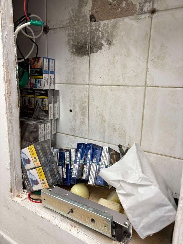 Packets of cigarettes hidden in a wall