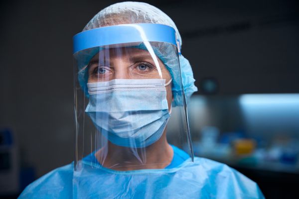 A woman wearing PPE