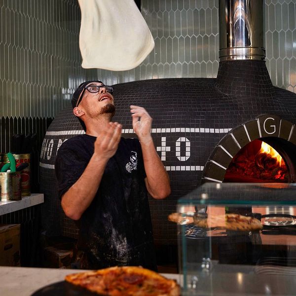 A chef at one of Moto Pizza's Essex restaurants