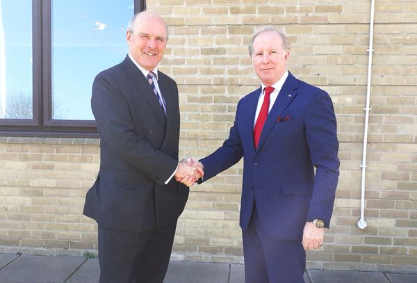 Lee Holloway, right, on his appointment in 2022 with predecessor Colonel John Ogden