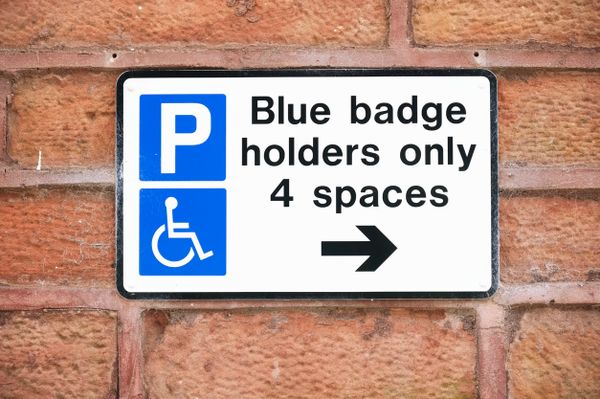 A blue badge holders only sign
