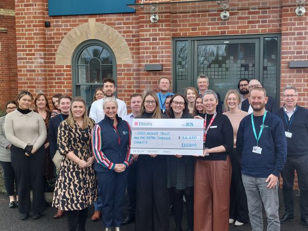 Ellisons team with a large cheque for £44,460