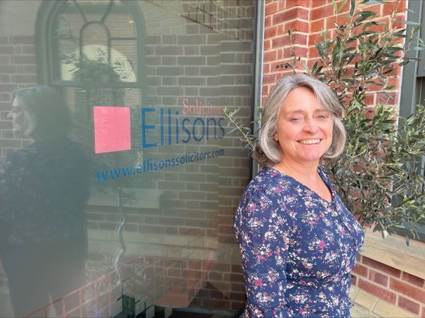Sally Ward standing outside the Ellisons office