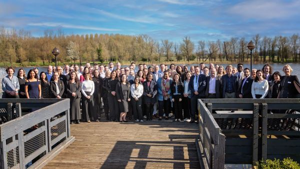 The DPO Centre team by a lake