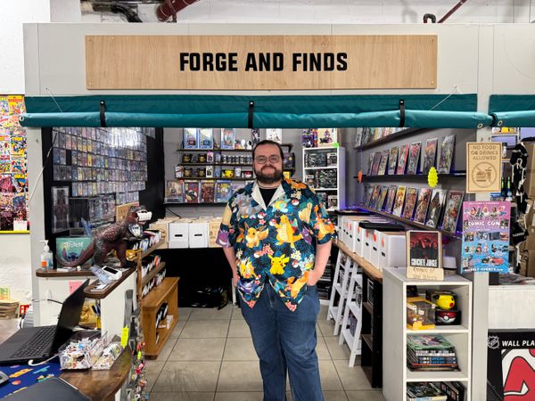 Harry, the proud owner of Forge & Finds inside Ipswich's Microshops on Carr Street