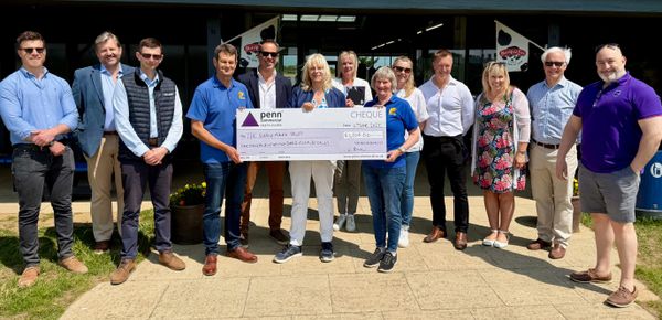 Penn Commercial presenting a cheque for £1,500 to The Suffolk Punch Trust