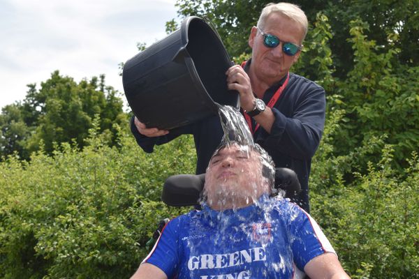 Peter Over, an ITFC ambassador, 'helps' out Harrison Mayhew-Kemp in the ice bucket challenge