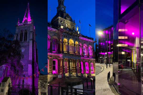 Ipswich Minster, the Town Hall and Willis Building all lit up pink