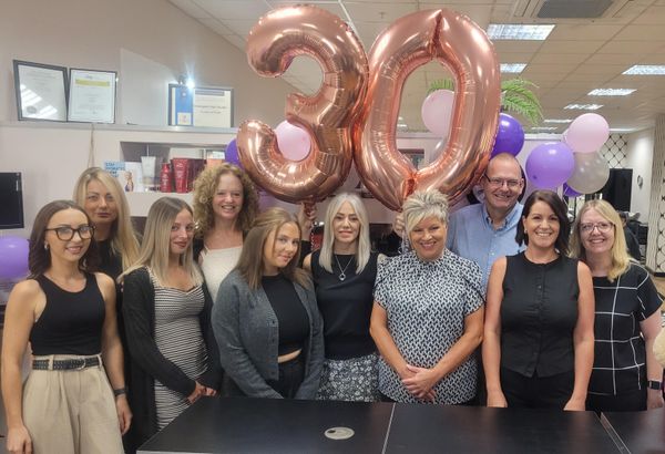 The Deesigner Hair team celebrating the salon's 30th birthday